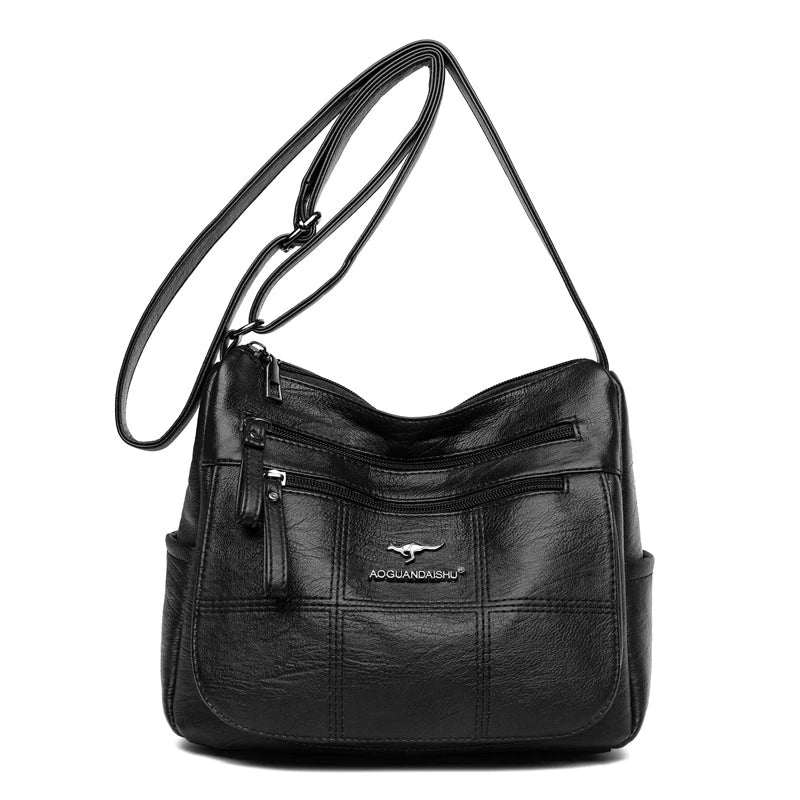 Bolsa feminina transversal Bali preta de couro sintético vista de frente