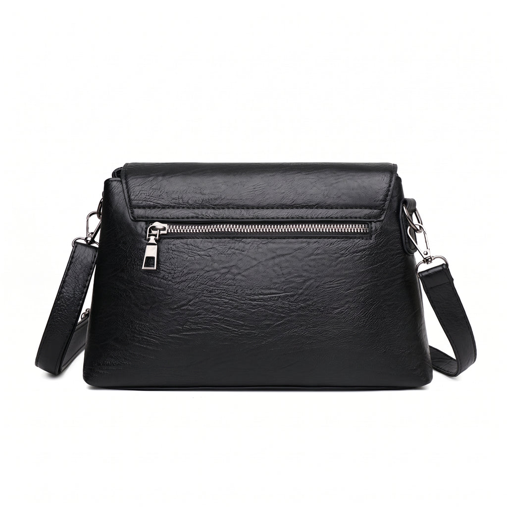 Costas da bolsa clutch preta com bolso com zíper