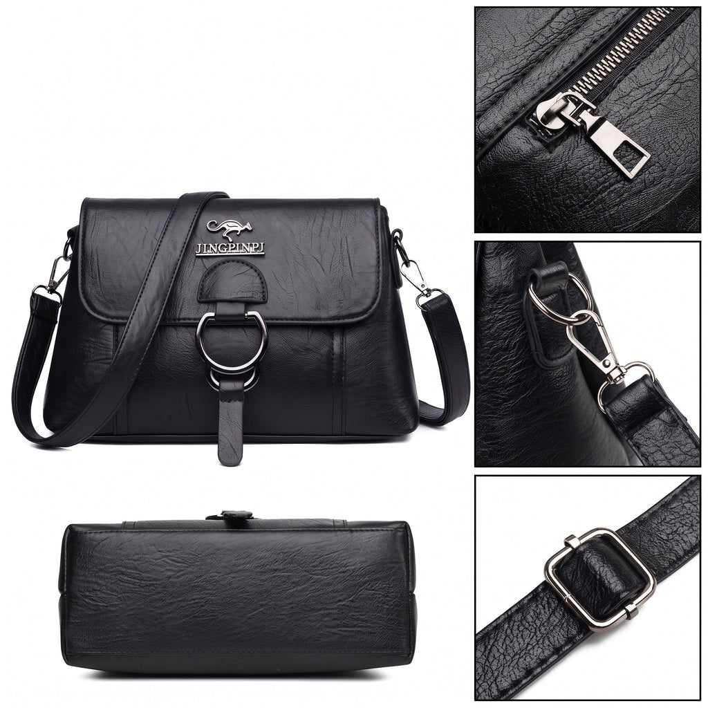 Detalhes da bolsa clutch preta: zíper, mosquetão da alça, fivela de regulagem e a base