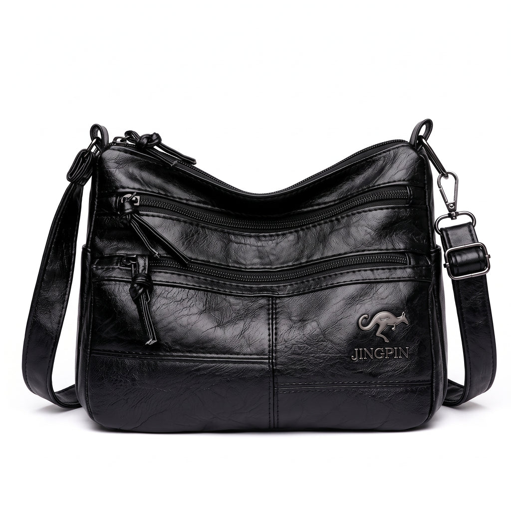 Bolsa transversal crossbody feminina preta de couro sintético vista de frente