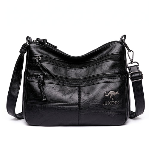 Bolsa transversal crossbody feminina preta de couro sintético vista de frente