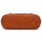 Base da bolsa tote caramelo vista por baixo