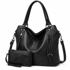 Bolsa tote bag feminina preta de couro sintético com a carteira que acompanha