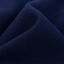 Textura da lã batida fosca e compacta do casaco azul marinho