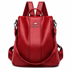 Mochila antifurto feminina vermelha de couro sintético vista de frente